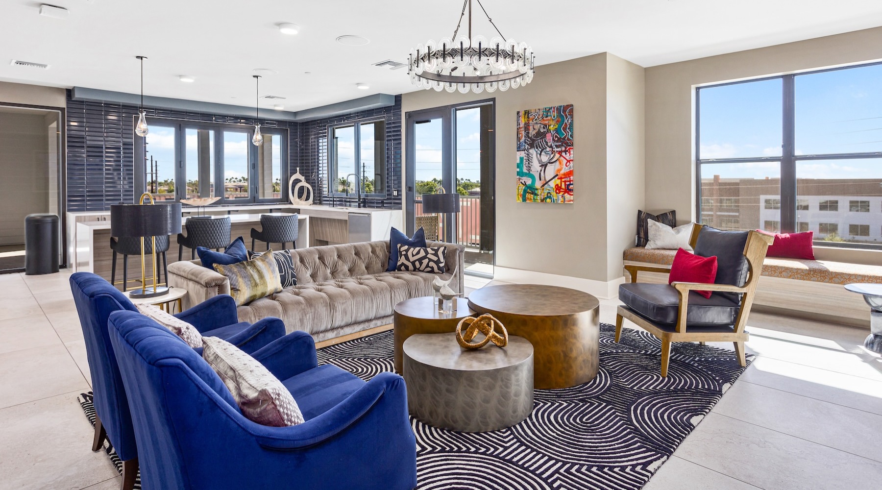 a clubroom with couches, chairs and a coffee table