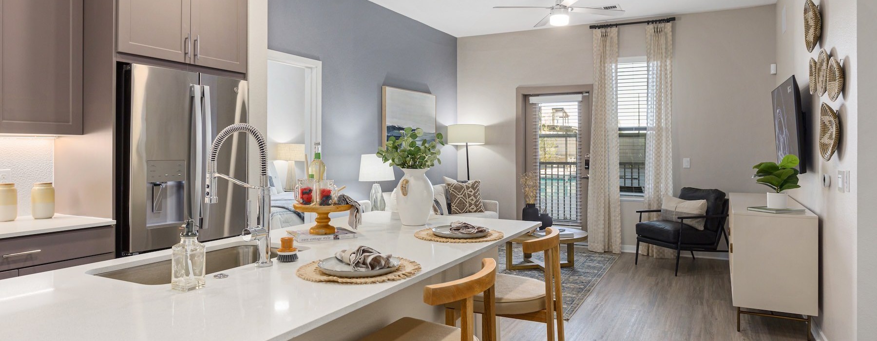a kitchen with a table and chairs